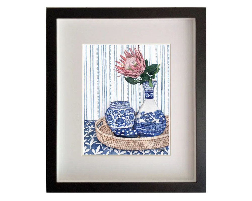 Blue and White vignette with protea on rattan tray