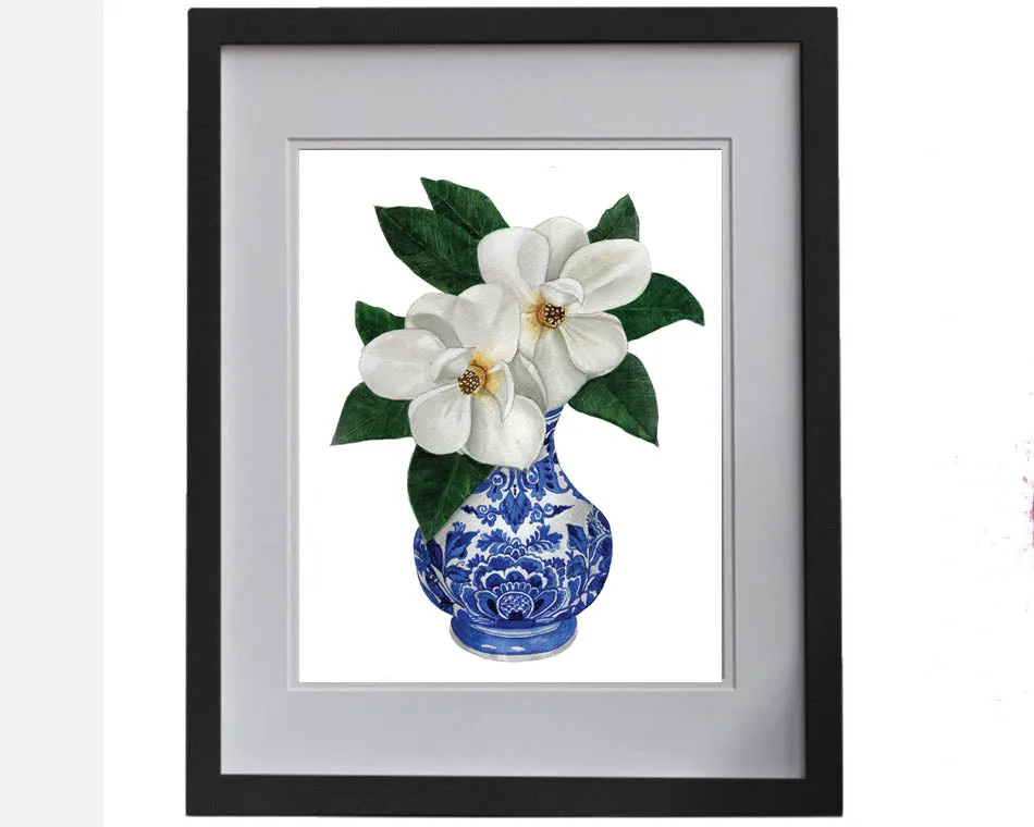 Print of magnolias in a blue and white vase